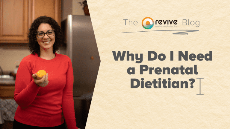 A smiling woman with curly hair, wearing glasses and a red sweater, holds a lemon in a kitchen setting. Beside her, a graphic with a beige background features the logo of 'The Revive Blog' by Revive Wellness Inc. and a large text question 'Why Do I Need a Prenatal Dietitian?' in bold, dark font.