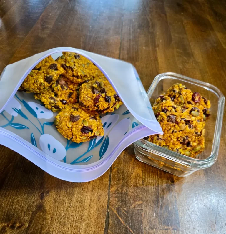 Homemade pumpkin‑seed cookies in bag and container